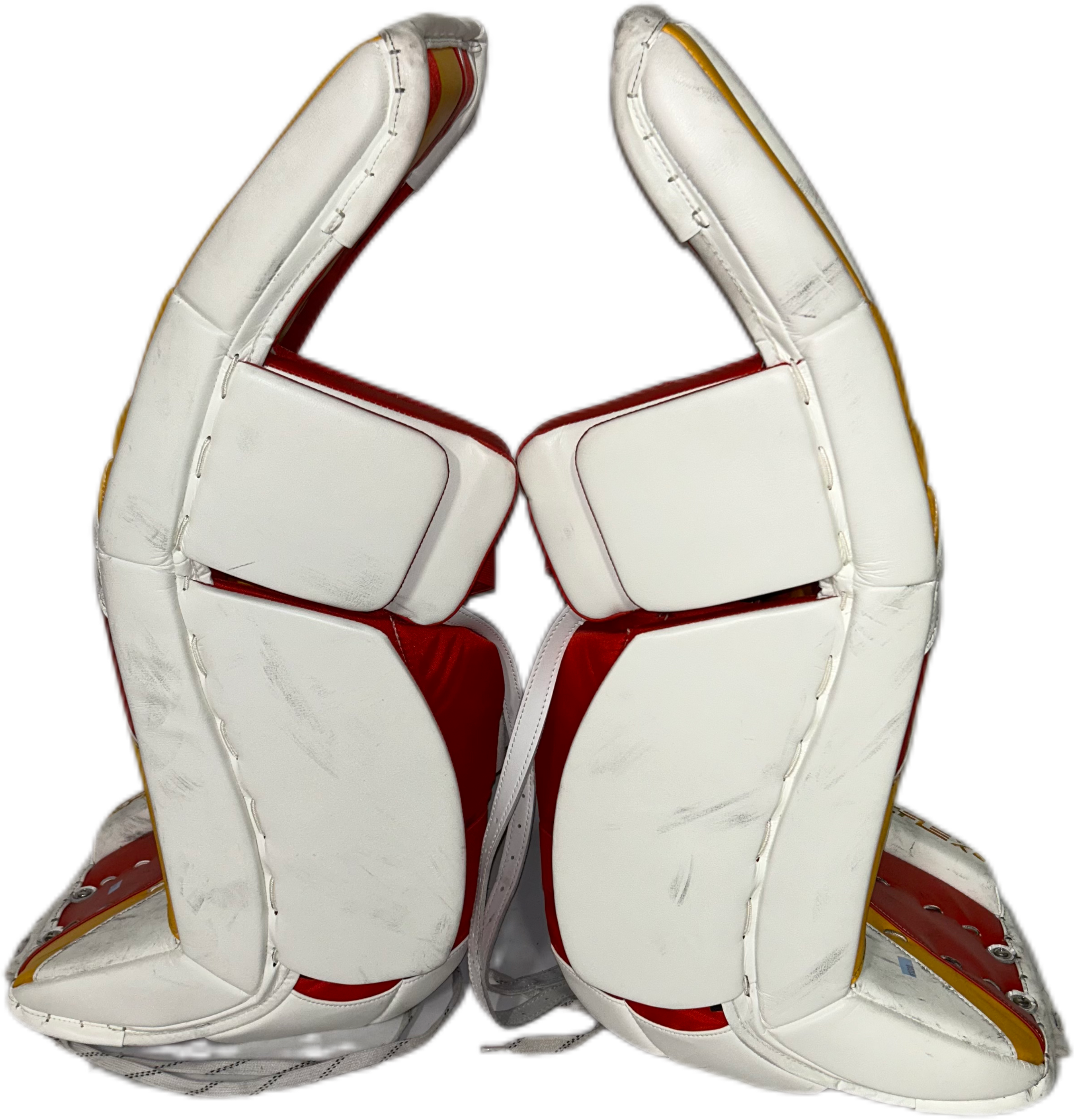 CCM Extreme Flex 6 - Used NHL Pro Stock Goalie Pads - Dustin Wolf (White/Yellow/Red)